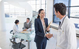 Corporate professionals talking with doctors